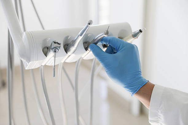 Professional Tooth Extraction technician working in Montgomery County County, IA